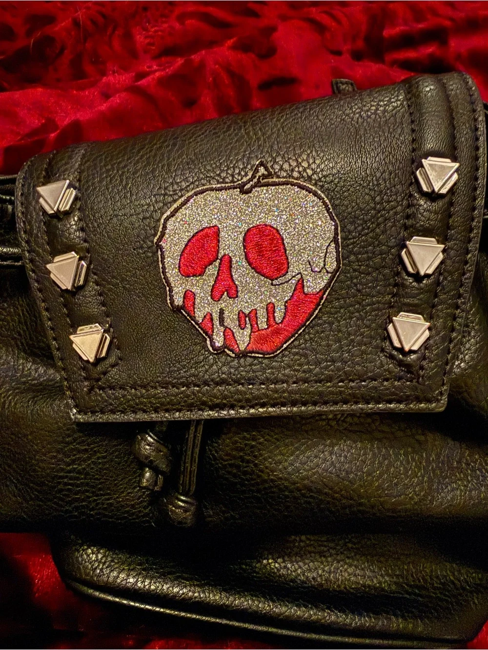 Danielle Nicole Studded Black Drawstring Backpack with Snow White Glitter Patch